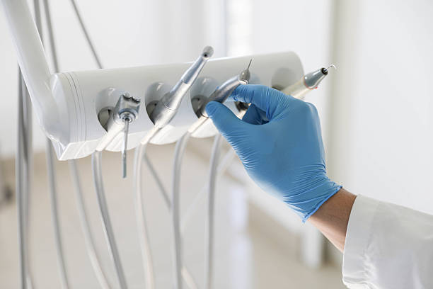 Professional Tooth Extraction technician working in Chapel Hill, NC